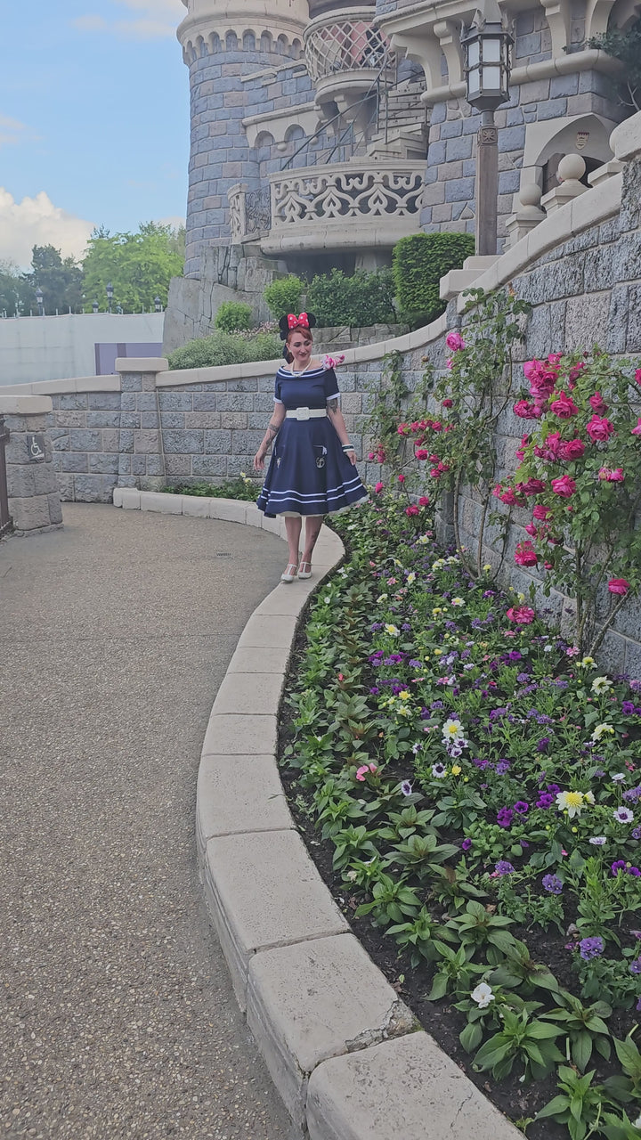Video a lady wearing a Navy Nautical Anchor Circle Dress