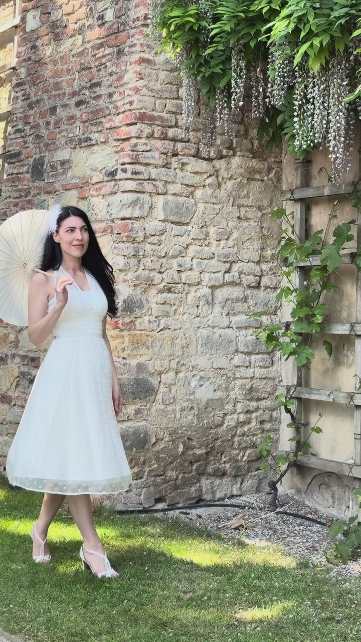 Video of Dorothea White Polka Dot Mesh Halter Midi Dress