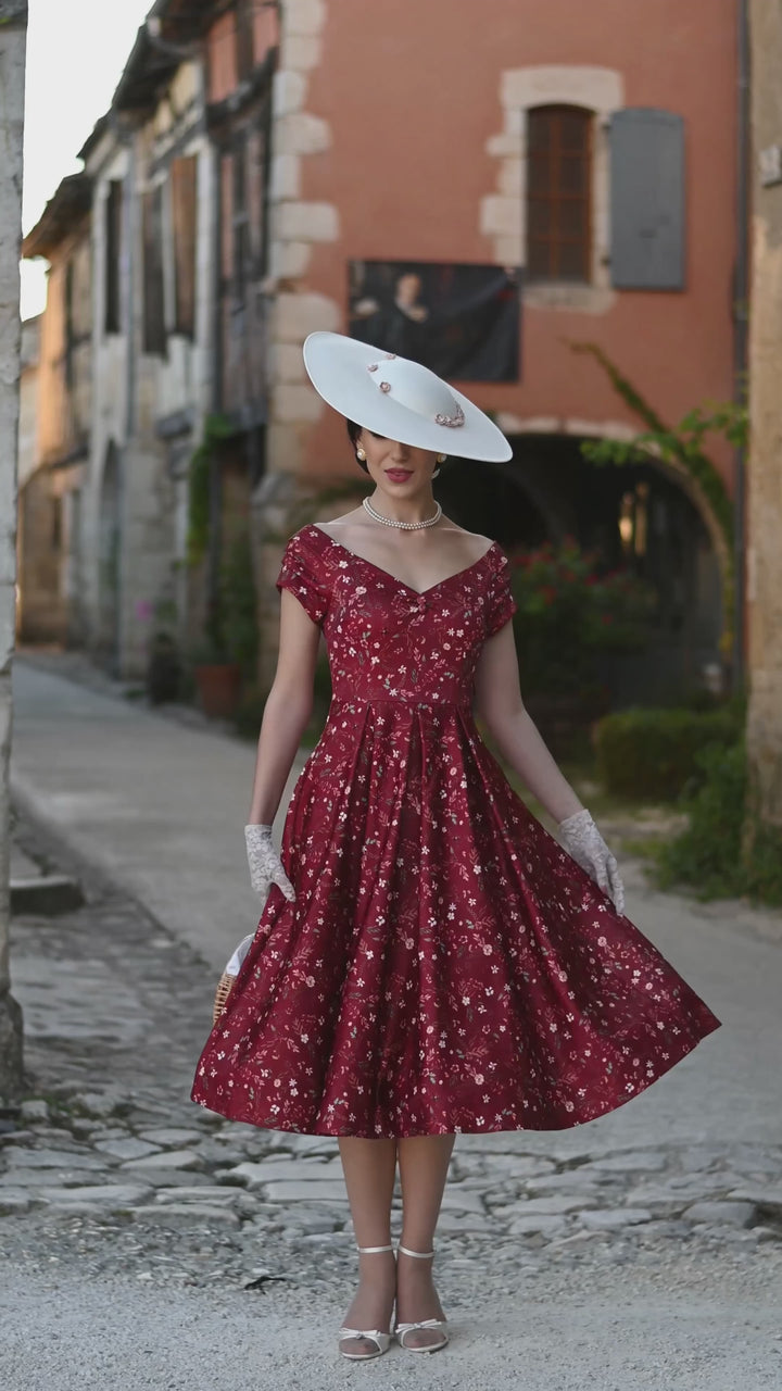 Video of an elegant lady in our Lily Ditsy Floral on Red Dress | Vintage Floral Dress