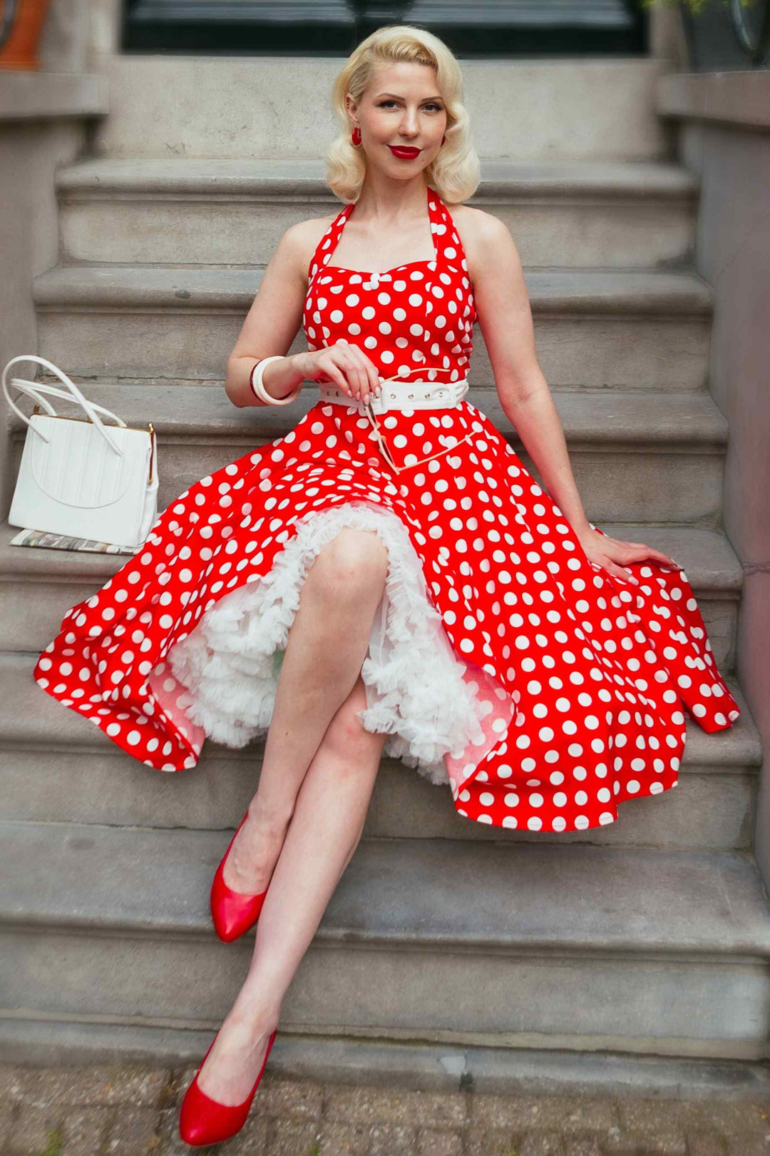 Lovely Model in a Daisy Red Polka Dot Halterneck Dress