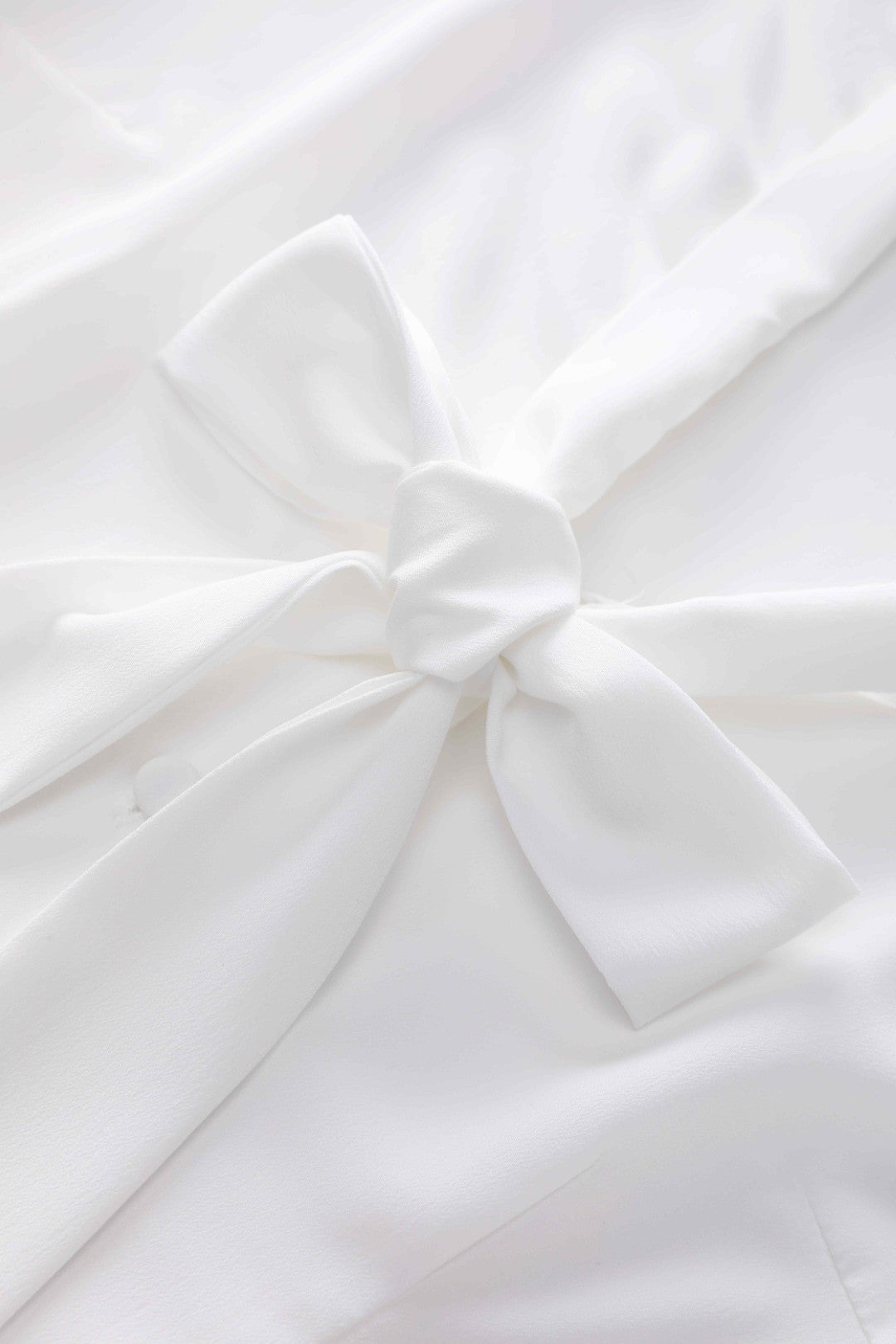 The bow-tie detail on Margaret Off White Blouse