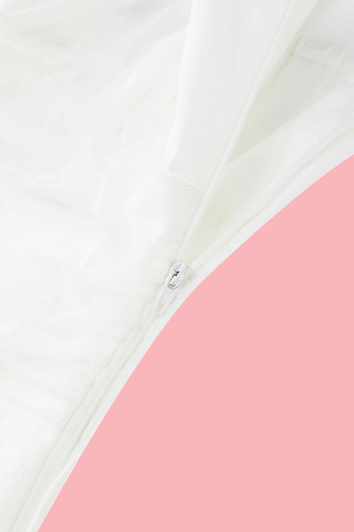 The zip detail of Dorothea White Polka Dot Mesh Halter Midi Dress